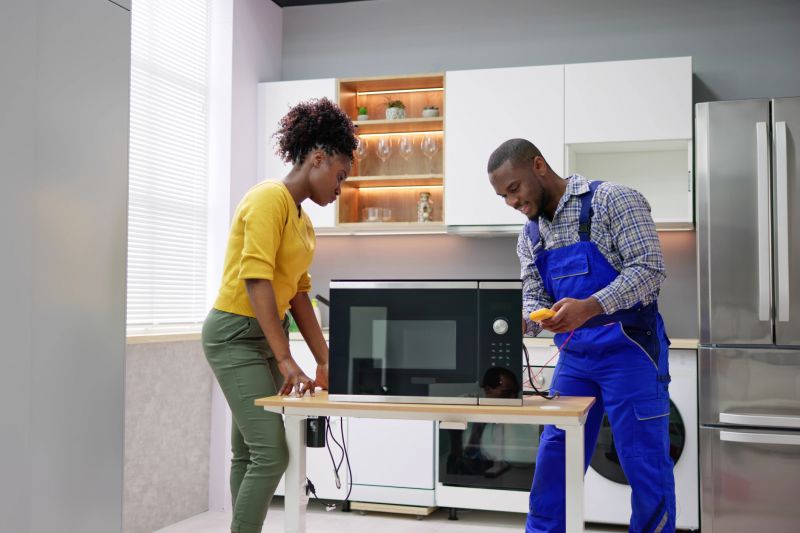 Local Microwave Oven Repair pros at work